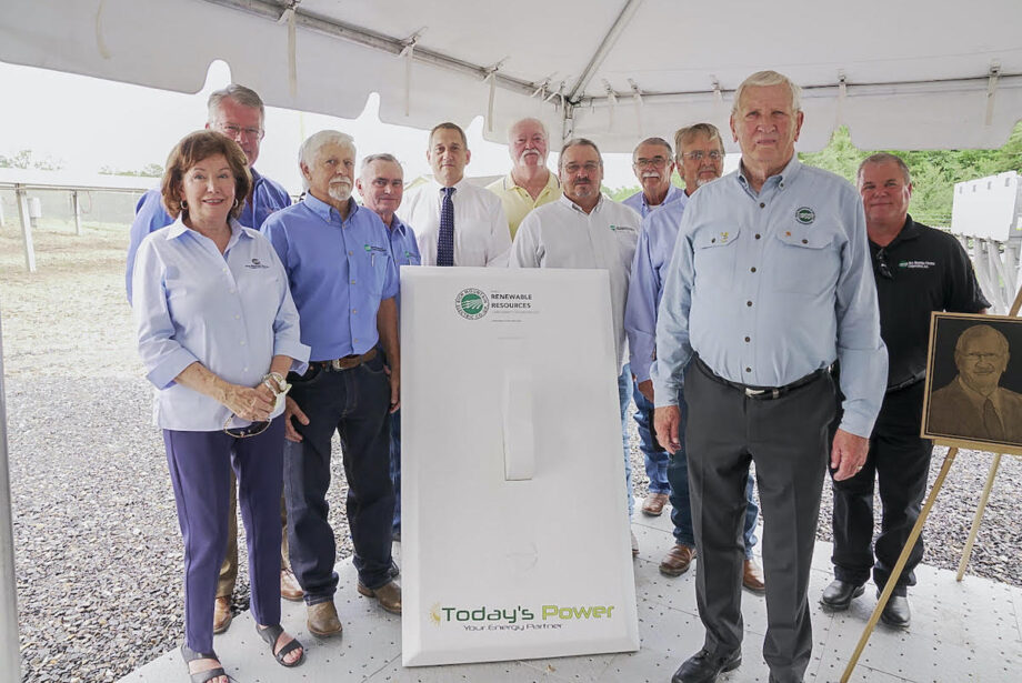 Leon Philpot, whose name adorns the new solar facility, is in the foreground at right, surrounded by others who&nbsp;unveiled the facility Thursday near Rich Mountain Electric Cooperative's headquarters in Mena.