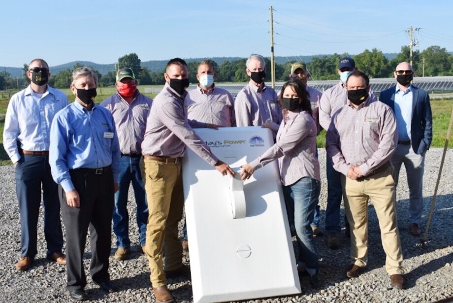 City officials and Today&rsquo;s Power Inc. staff&nbsp;flip a symbolic solar switch Thursday&nbsp;on a 1.5-megawatt municipal solar array in Paris, Arkansas.