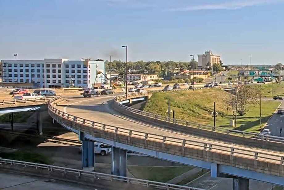 The Arkansas State Highway Commission is seeking about 8,300 SF of land from the property on which a new Holiday Inn Express, the blue building on the left, is being built.