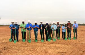 Officials with Today's Power Inc., the Star City School District and the Yorktown Water Association break ground on solar arrays that will benefit the district and association.