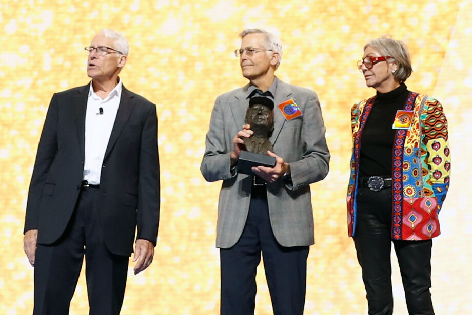 Rob Walton, Jim Walton and Alice Walton present the Entrepreneur of the Year award at the 2019 Walmart shareholders meeting in Fayetteville.