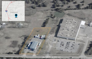 Warehouse-office building at 2214 S. City Lake Road in Fayetteville. (Parcel lines are approximate and shown for illustration only.)