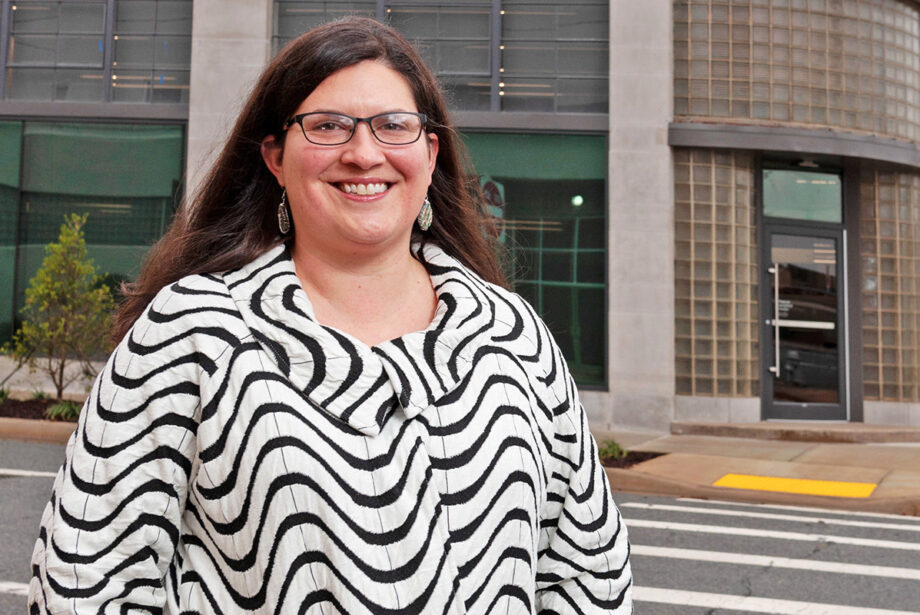 Rachel Patton of Preserve Arkansas wants higher historic tax credits for eligible projects.  Here, she’s outside one such project, Polk Stanley Wilcox’s building on Spring Street.