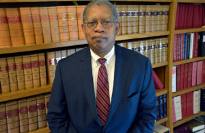 Harold J. Evans of the University of Arkansas System