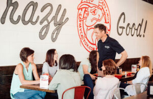 Travis Hester, owner of several Eat My Catfish restaurants in Arkansas, says an increased federal minimum wage would add hardship at a time when “it’s never been this tough to drive profit to the bottom line.”