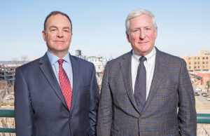 Sam Walls III, president and COO of Arkansas Capital Corp., and Rush Deacon, CEO of the community development financial institution