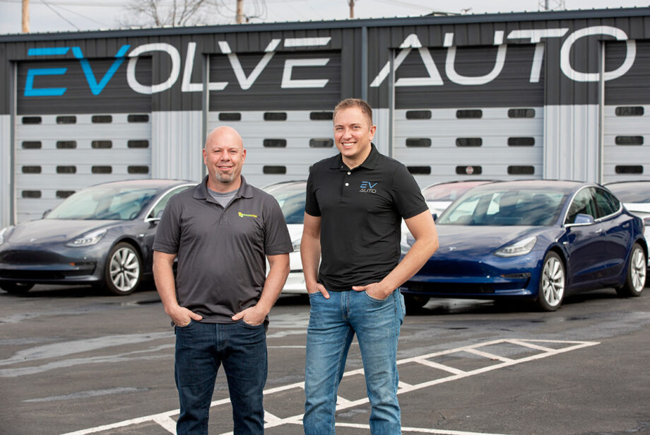 Greg Bradley, left, residential sales manager at Seal Solar, and Evolve Auto partner Collin Riggin are gearing up to offer Arkansans electric cars, solar panels and EV charging stations for their homes or businesses, perhaps packaged into a single financing deal. Seal took an “aggressive stake” in Evolve, the state’s only exclusively electric vehicle dealership.
