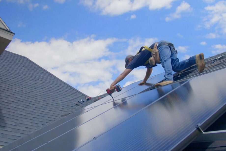 A solar installer at a job financed via Loanpal, which finances sustainable home projects. It opened a planned 100-worker operation last month in Bentonville.