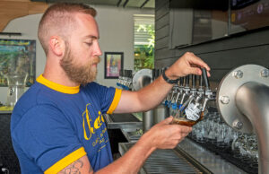 Bradley Riggs, chief executive officer of Bike Rack Brewing of Bentonville, said his company has emerged from the COVID-19 pandemic stronger.