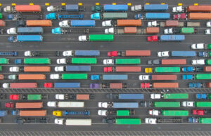 Loaded cargo trucks wait in queues at the Port of Los Angeles.