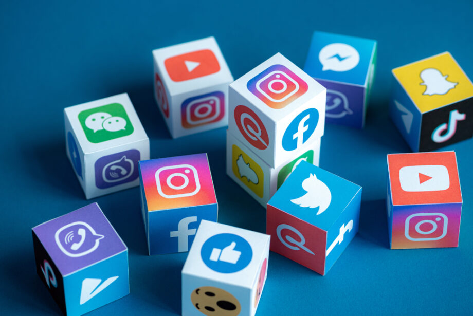 A paper cubes collection with printed logos of famous social media networks and online messengers, including as Facebook, Instagram and YouTube.