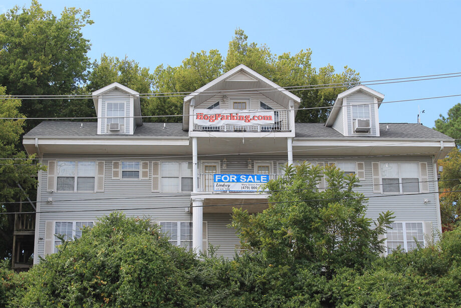 John La Tour’s sprawling residences overlooking Reynolds Razorback Stadium can be yours for $12 million.