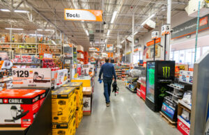 A shopper walks down an aisle at a Home Depot in Oregon in 2018.&nbsp;
