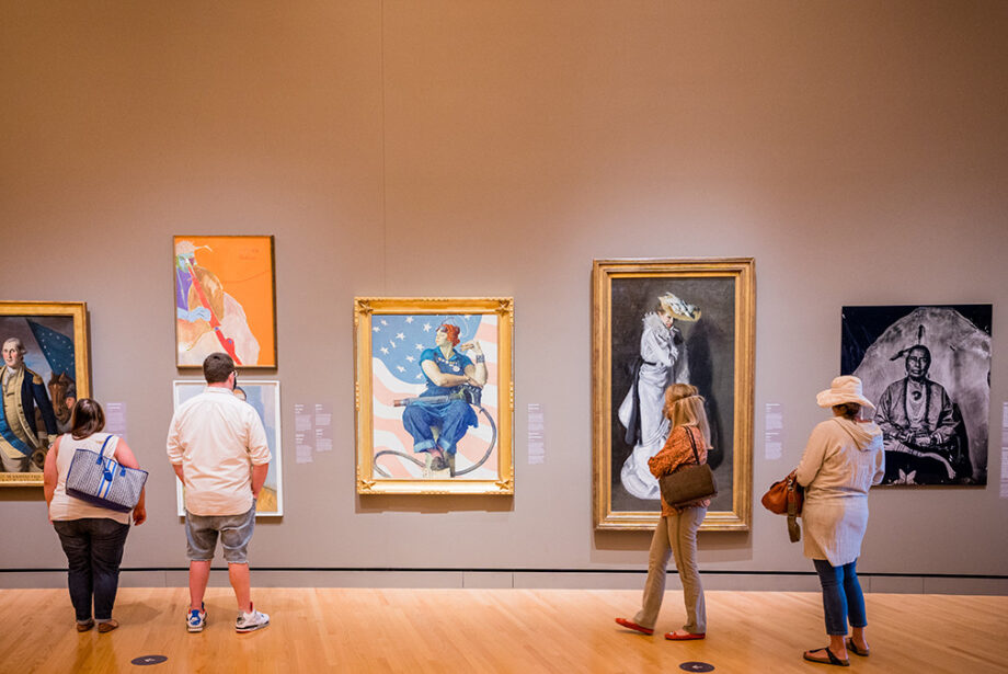 Visitors to the museum view some of its iconic works, including Norman Rockwell’s “Rosie the Riveter.”