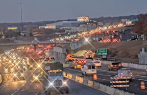 Evening rush hour traffic moves through the Interstate 30 Crossing construction zone in Little Rock on Nov. 23, 2021