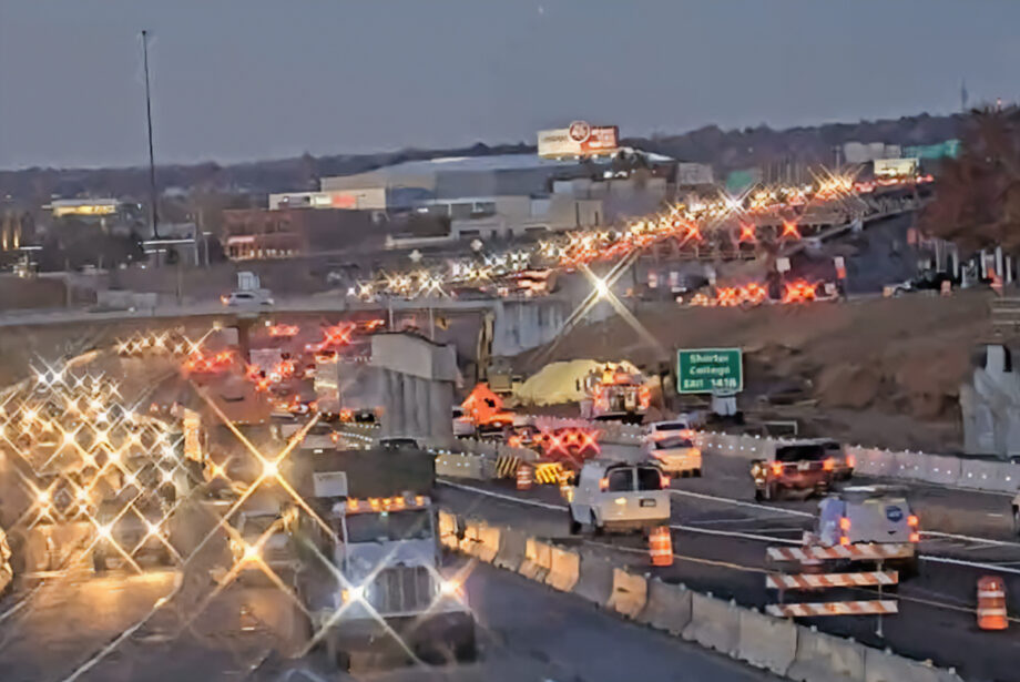 Evening rush hour traffic moves through the Interstate 30 Crossing construction zone in Little Rock on Nov. 23, 2021