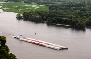 A file photo of a barge with cargo on the Mississippi River&nbsp;