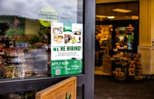 A sign adverstising open positions at a North Carolina grocery chain