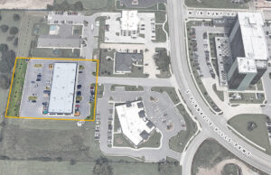 An affiliate of Colliers International Northwest Arkansas raised the money to buy the property outlined above, across the street from the Hunt Tower in Rogers. (Parcel lines are approximate and shown for illustration only.)