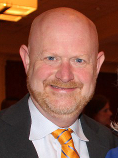 A photo of Jay Barth at an event photographed by Arkansas Business in 2017.