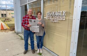 Danny and Pam Cook hold an edition of the Warren Eagle Democrat