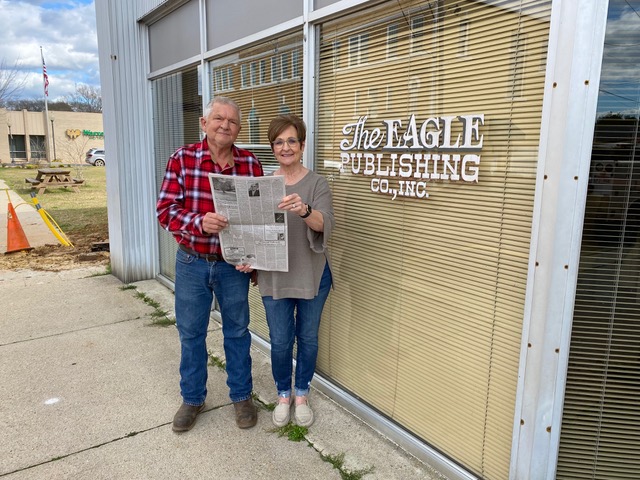 Danny and Pam Cook hold an edition of the Warren Eagle Democrat