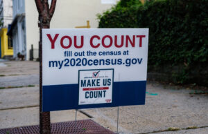 A sign in New York encourages residents to complete the U.S. Census survey in 2020