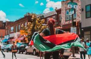 A file photo of a woman partcipating in the Philadelphia Juneteenth Parade in 2019
