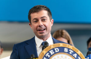 A file photo of U.S. Transportation Secretary Pete Buttigieg speaking at a news conference in New York in June 2021