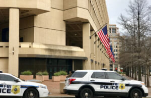 FBI vehicles outside the agency's headquarters in Washington, D.C.