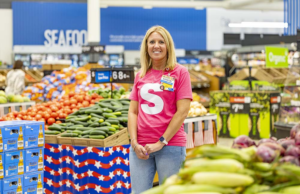 Kristin Turnbow at Walmart Store 144 in Fayetteville is one of thousands of Walmart managers and just about all other employees benefiting from better pay these days.