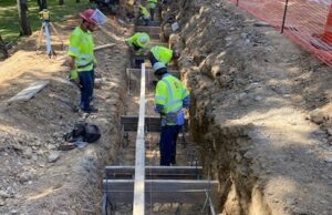 Crews work to reroute utility lines so that an upgrade to west Little Rock's Rodney Parham Road can move forward.&nbsp;