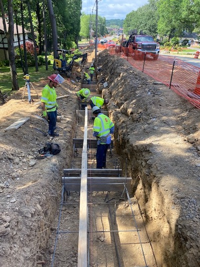 Crews work to reroute utility lines so that an upgrade to west Little Rock's Rodney Parham Road can move forward.&nbsp;