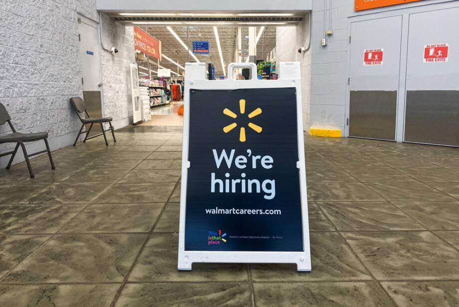 A sign advertising open positions at a Walmart in Olney, Illinois