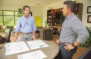 Armstrong, left, and Brown announced the first tenant in their new e-commerce park in Jonesboro in May. Hytrol Conveyor Co. Inc.&rsquo;s 150,000-SF warehouse is scheduled for completion in the spring.