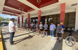 LaneShift CEO Ryan Hale addressed Metroplan members before they left on a bicycle tour of the Razorback Greenway from the Graduate Hotel in Fayetteville.
