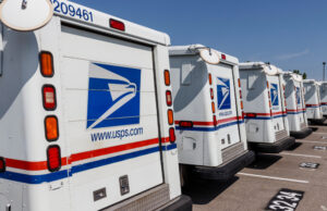 U.S. Postal Service trucks parked at a facility in Indianapolis