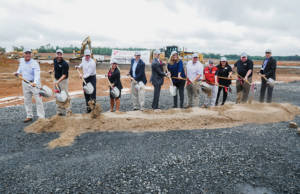 Tractor Supply Co. executives and local and state officials break ground on the company's distribution center in Maumelle, Arkansas, on Aug. 23, 2022.