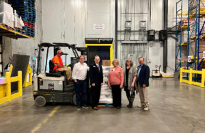 From left to right: Mark Isbell with Isbell Farms, Kevin McGilton with Riceland Foods, Rhonda Sanders, Arkansas Foodbank CEO, Robin Ralston with Ralston Family Farms, and Kelly Robbins, Arkansas Rice Executive Director in the Warehouse for the the donation announcement at the Arkansas Foodbank.