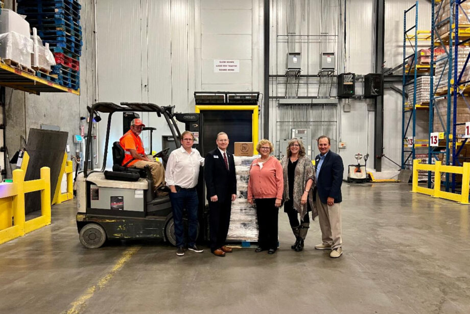 From left to right: Mark Isbell with Isbell Farms, Kevin McGilton with Riceland Foods, Rhonda Sanders, Arkansas Foodbank CEO, Robin Ralston with Ralston Family Farms, and Kelly Robbins, Arkansas Rice Executive Director in the Warehouse for the the donation announcement at the Arkansas Foodbank.