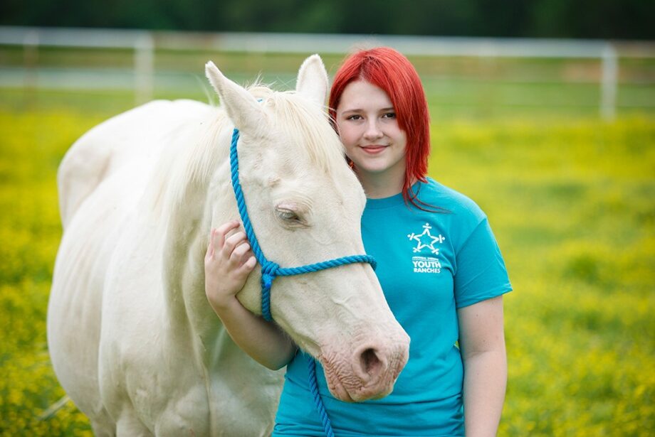 Ranch boys and girls help raise cattle, lambs and other animals through ASYR’s educational farm program.