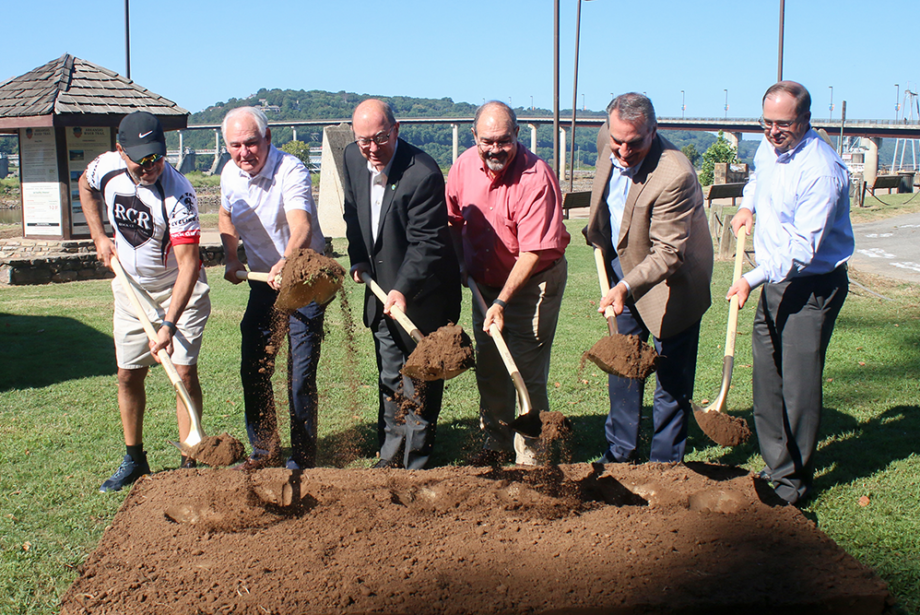 From left: Charles Mobley of the Major Taylor Cycling Club;&nbsp;North Little Rock Mayor&nbsp;Hartwick; Pulaski County Judge Bert Parker with Big Dam Bridge Foundation; and&nbsp;North Little Rock Parks Director Steve Shields break ground on the Big Dam Bridge North Plaza project.