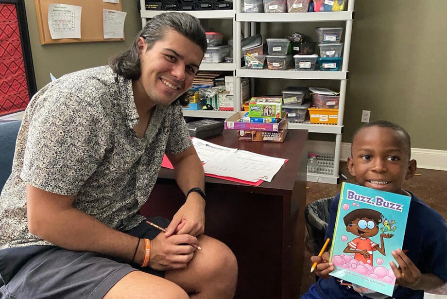 Tutoring time is a weekly highlight for AR Kids Read students. Smiles come naturally to John and Elijah in their weekly time together.
