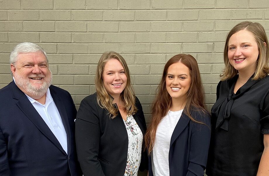 APCF’s team of Chris Collier, Cara Clements, Gracie Brought, and Jamie Moody stand ready to serve.