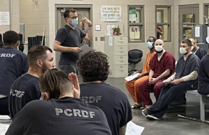 Executive Director Cory Jones teaching mindfulness at Pulaski County Jail.
