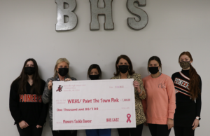 Batesville students from Pioneers Tackle Cancer present event proceeds to WRH Foundation.