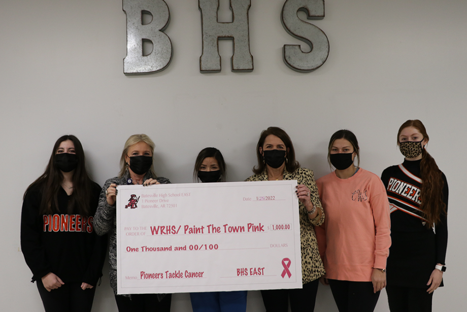 Batesville students from Pioneers Tackle Cancer present event proceeds to WRH Foundation.