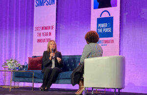 Shelley Simpson, president of J.B. Hunt Transport Services Inc. of Lowell, talks to Shannon Hendrix, senior vice president and chief administrator at Arkansas Children's Northwest of Springdale, during the 2022 Women's Foundation of Arkansas Power of the Purse luncheon.