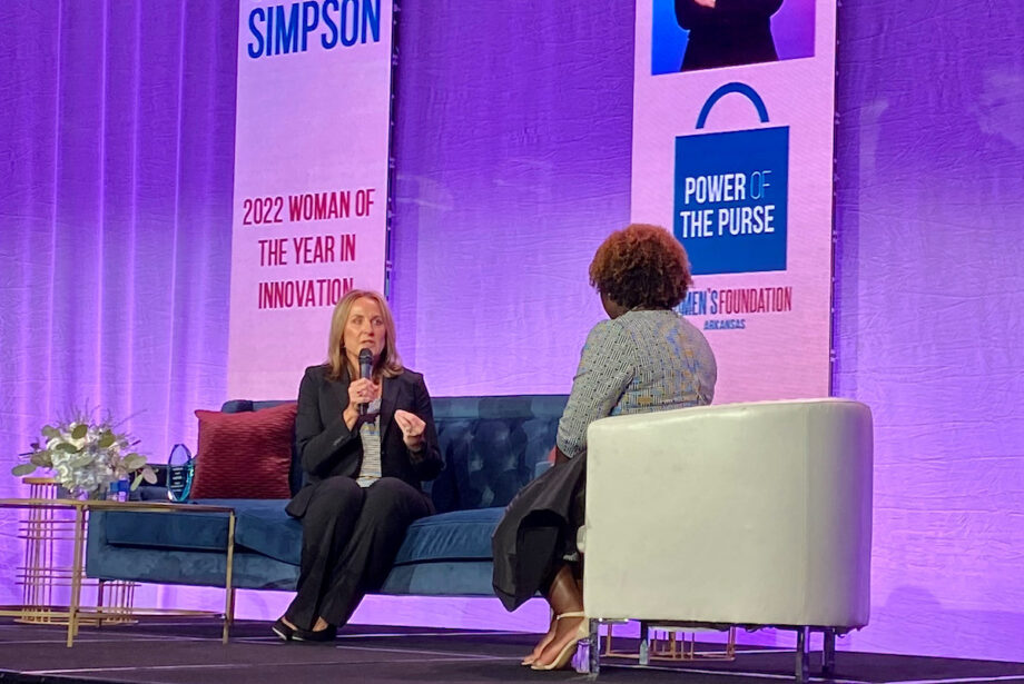 Shelley Simpson, president of J.B. Hunt Transport Services Inc. of Lowell, talks to Shannon Hendrix, senior vice president and chief administrator at Arkansas Children's Northwest of Springdale, during the 2022 Women's Foundation of Arkansas Power of the Purse luncheon.