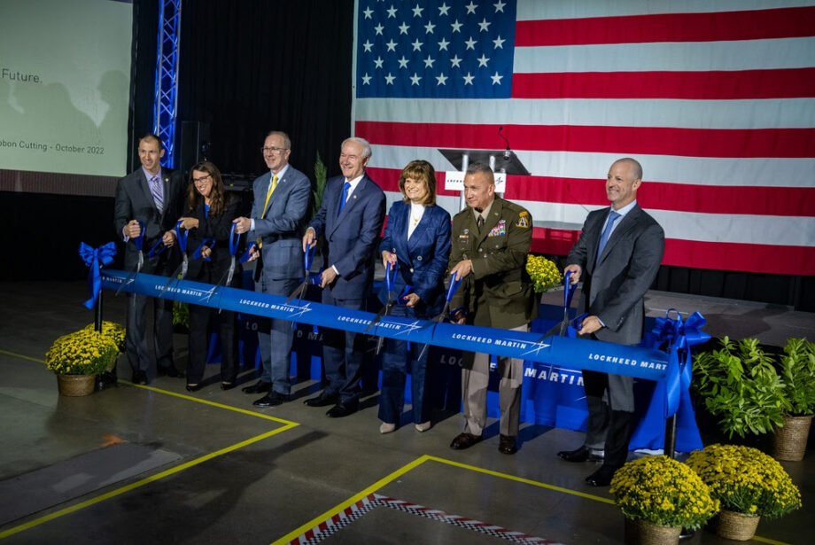 Officials from Lockheed Martin and the U.S. Department of Defense join Arkansas Gov. Asa Hutchinson at a ribbon-cutting ceremony for an expansion of the company's Camden facility.